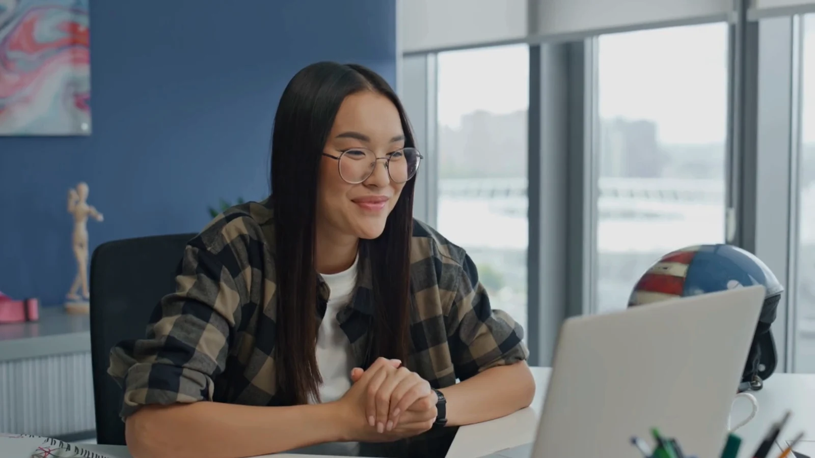 Sales representative talking with a customer online